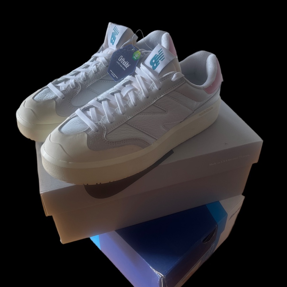 New Balance White Sneakers with Pink Heel Accent